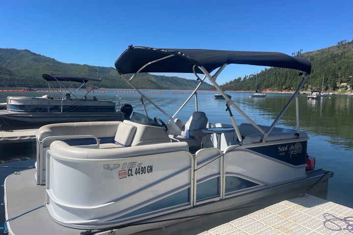 a boat parked next to a body of water